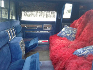 I am not sure if those are foot rest or jump seats? That red throw though, ewww...